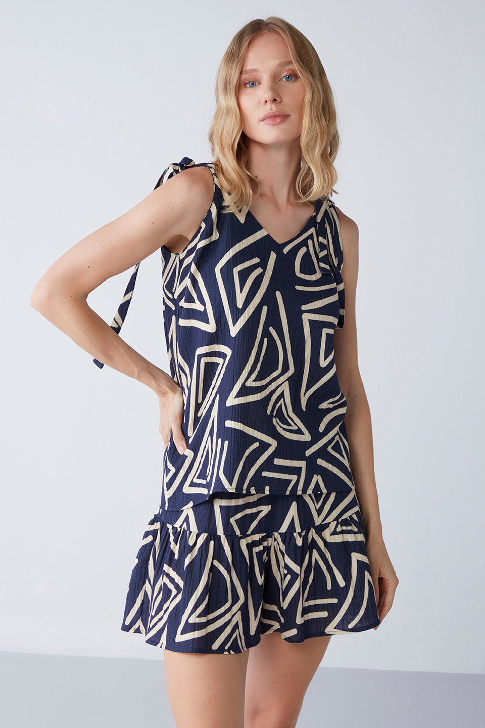 Close-up of the Popjammies Abstract Design Pyjama Set showcasing the bold navy and beige abstract print on a sleeveless top.