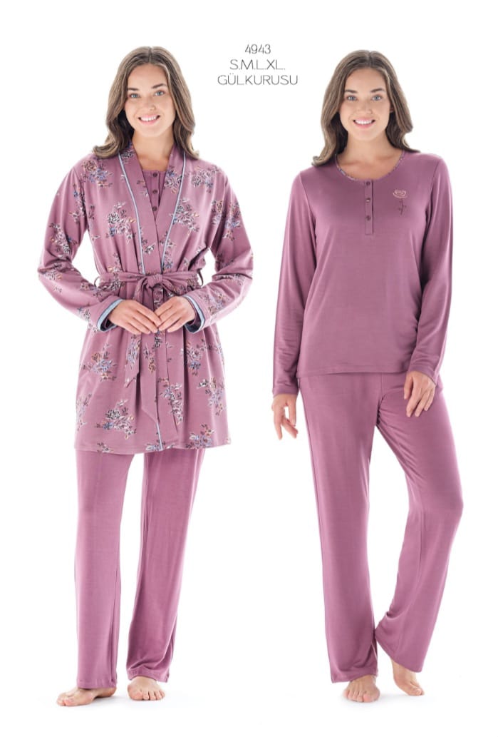 Two models wearing a three-piece pajama set which includes pants, a top, and a robe with a floral design in purple color.