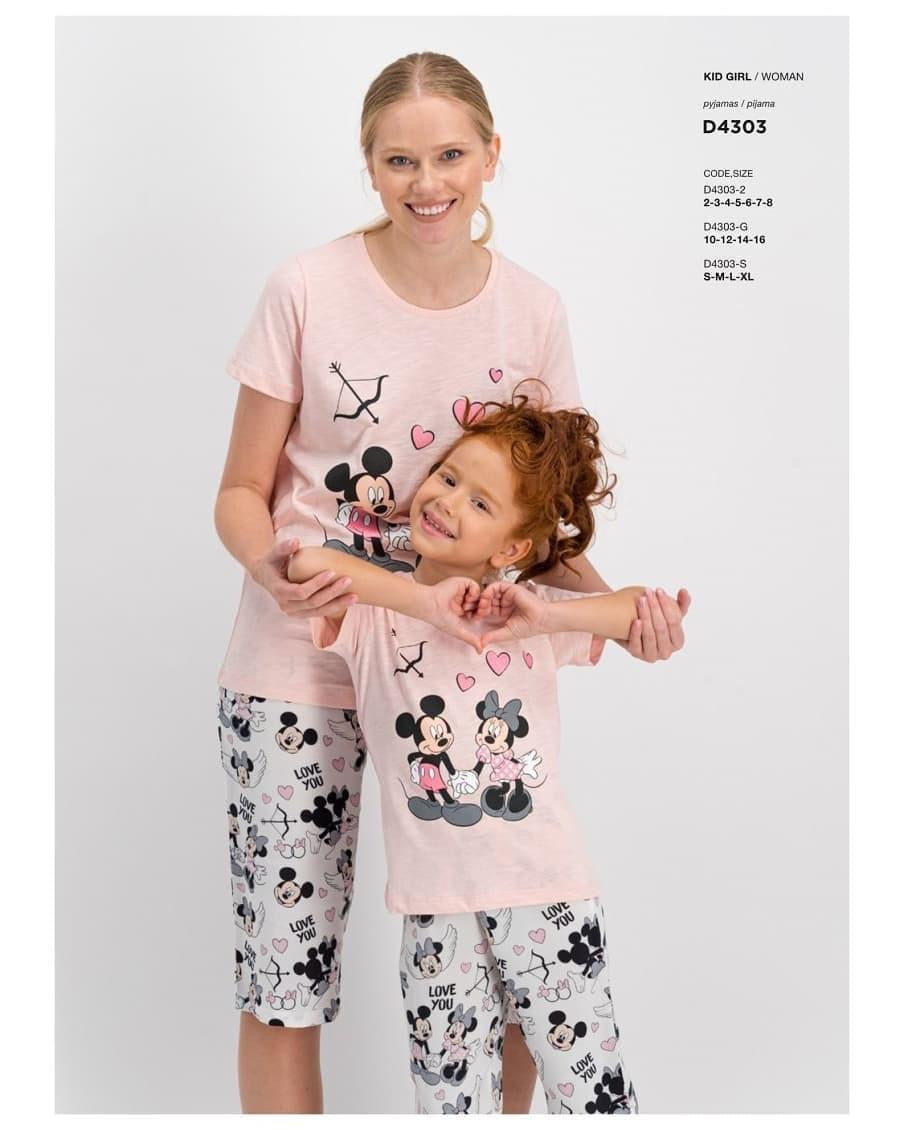 Woman and child wearing matching light pink short-sleeve tops with Mickey and Minnie prints, paired with matching capri pantacour with all-over Mickey and Minnie prints