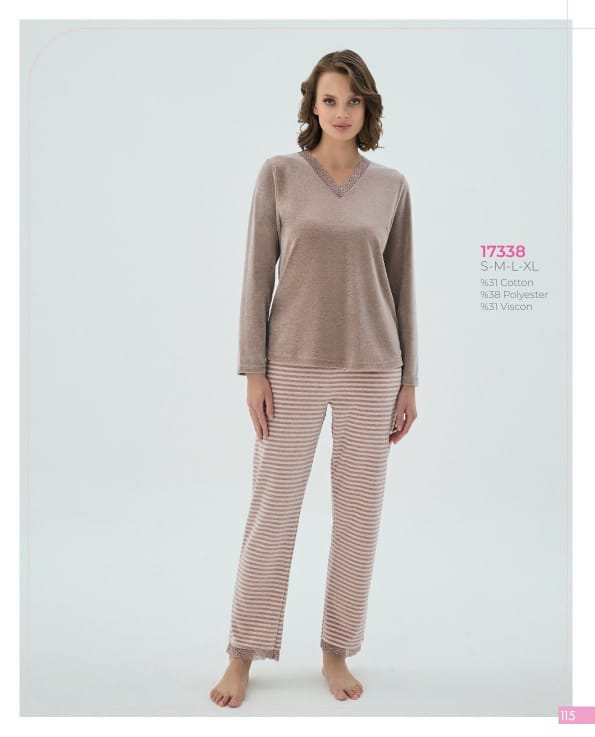 Woman wearing a brown top and striped pants on a white background
