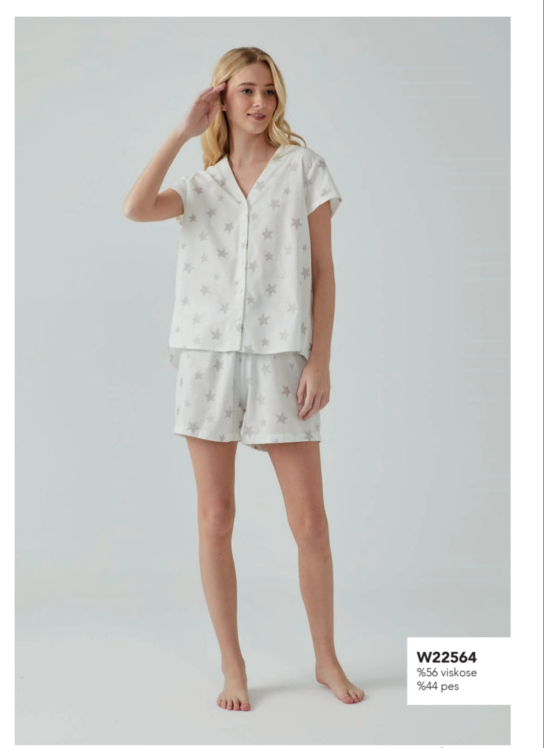 Woman in Popjammies Starry Night Pyjama Set, product shot with model.