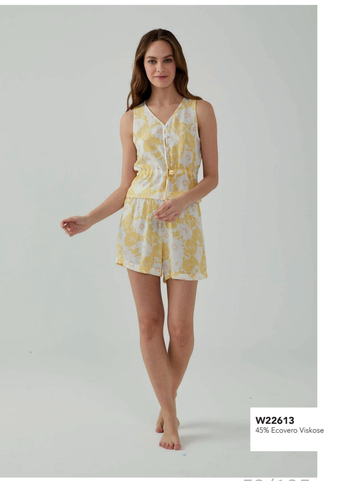 Product display of the yellow floral print pyjama set from Popjammies, featuring a sleeveless top and matching shorts.